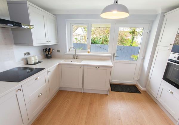 Kitchen with doors to the rear garden