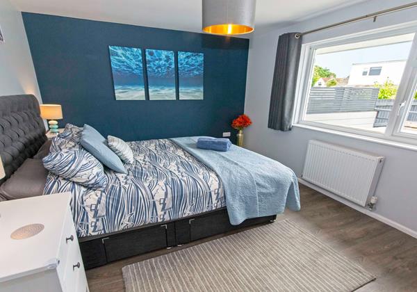 Master bedroom with space for a cot