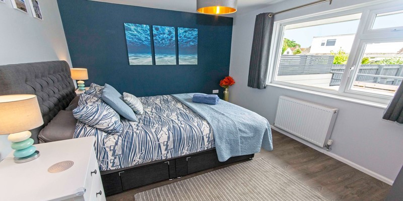 Master bedroom with space for a cot