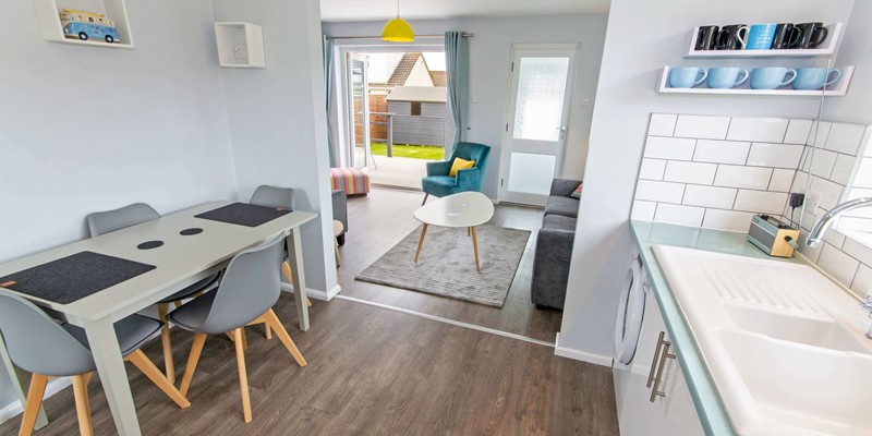 Open plan living with patio doors to the terrace