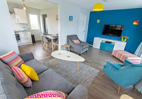 Comfortable lounge with hi tech tv and netflix