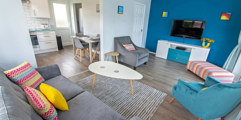 Comfortable lounge with hi tech tv and netflix