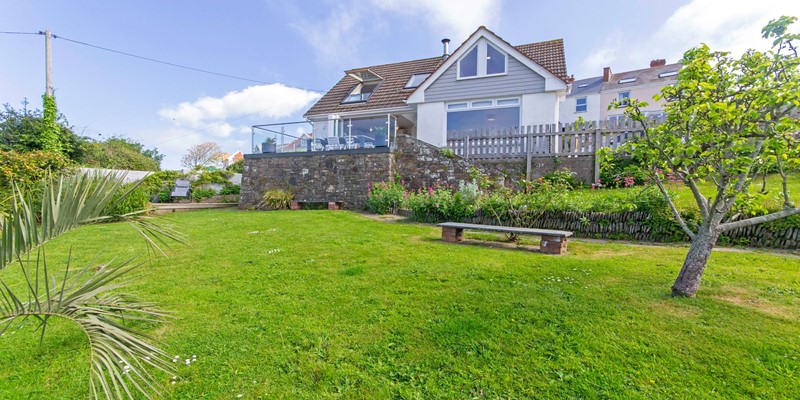 Large lawned garden with countryside views