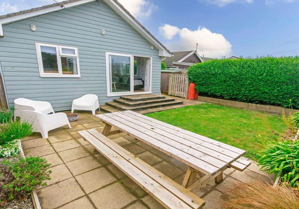 Rear Garden with patio furniture