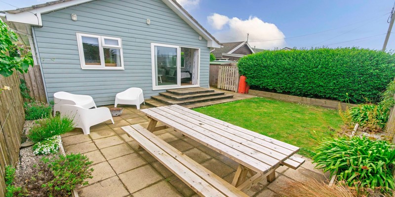 Rear Garden with patio furniture