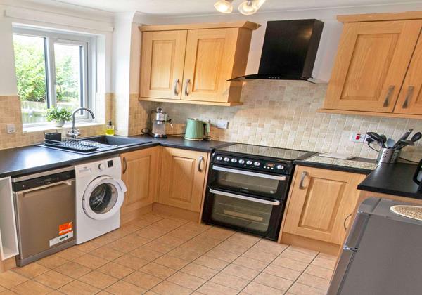 Spacious kitchen with coffee maker