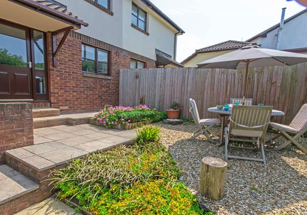 Suntrap garden with patio furniture
