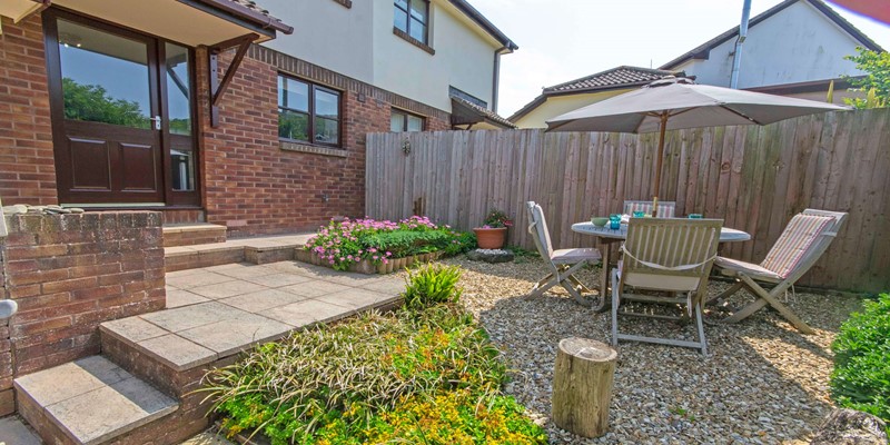 Suntrap garden with patio furniture