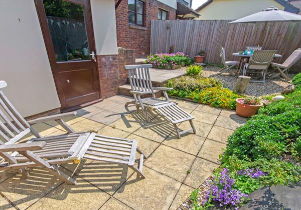 Relaxing sunloungers and rear garage access