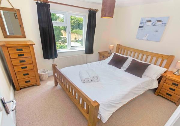 Double bedroom with grand oak furniture