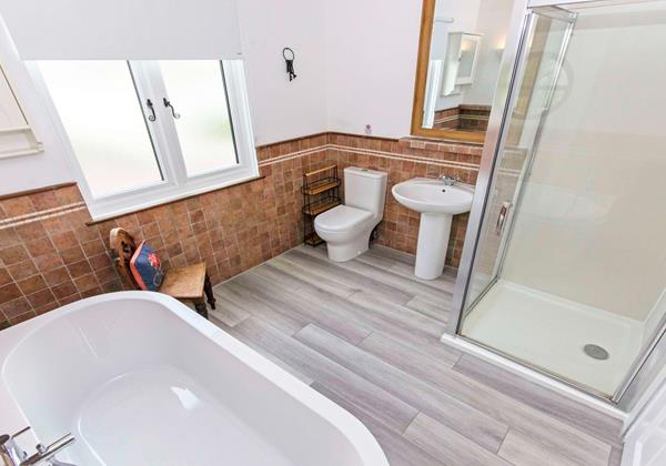 Roman bath themed bathroom