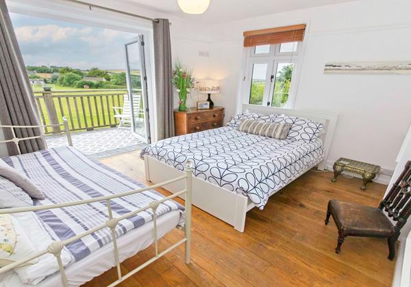 Step out balcony from this bedroom