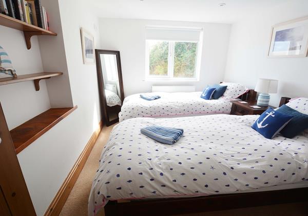 Downstairs twin beds for senior or mobilty impaired and ideal for teenagers with a shower room next door.