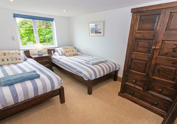 Twin beds with shower room next door located downstairs