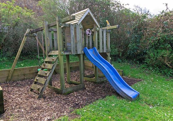 Adventure play area slide and climbing frame