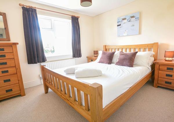 Double bedroom with grand oak furniture